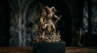 A bronze-finished cold-cast horror collectible statue with metallic patina