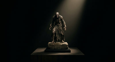 A horror collectible statue under museum spotlighting, illustrating proper display and care