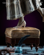 Detail of Mary Shelley's feet on the antique footstool, Frankenstein Creators Edition base